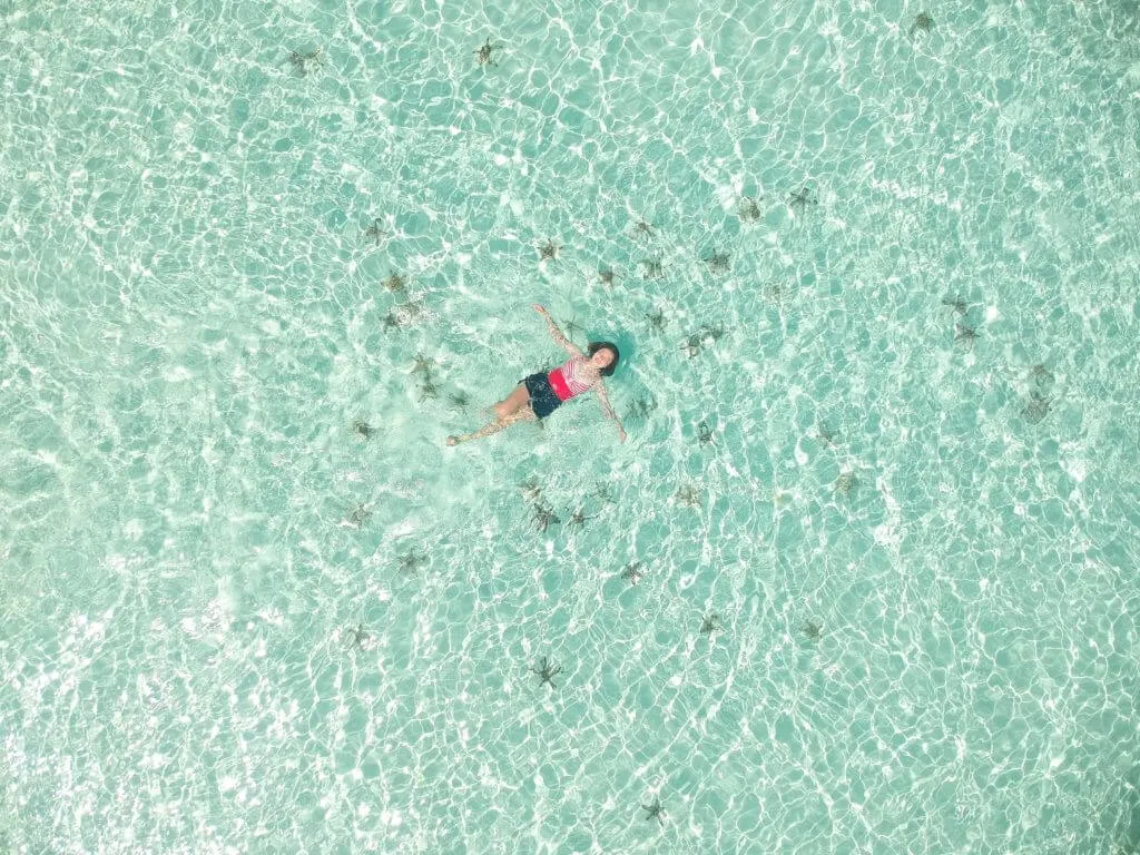 Floating above starfish Sandbar in Candaraman Island during hightide 